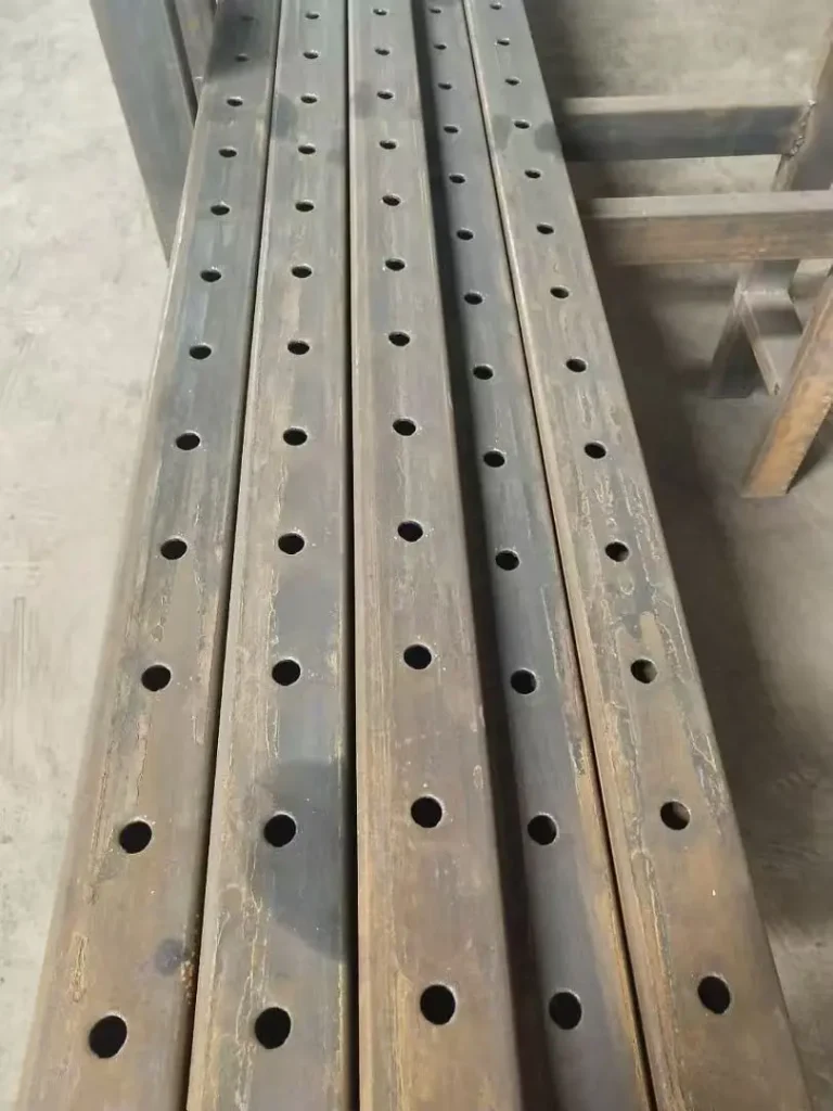 Consistent hole positioning on tubes processed by an automatic punching machine