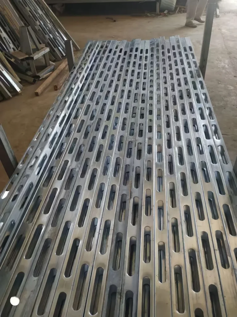 Punched metal profiles with repeated long holes